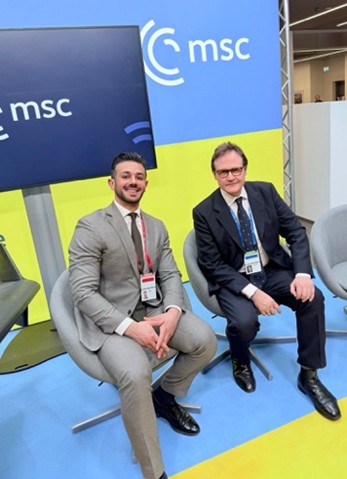 two men on panel sitting