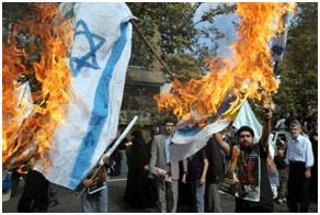 Burning Israeli flags at a Quds Day rally in Tehran
